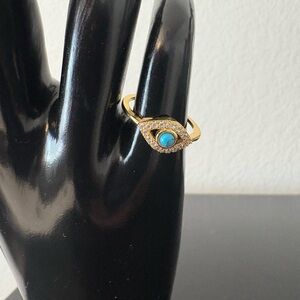 Elegant Gold and Blue Ring with Turquoise Gem
